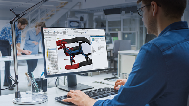 An engineer models in the SOLIDWORKS 3D design environment