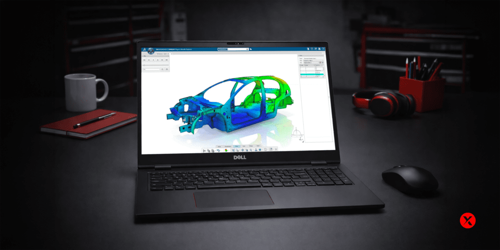 A dark, minimalist engineer’s workspace with a smooth black desk surface. At the center, a Dell laptop displays a 3D simulation of a car frame analysis, with a blue-to-green gradient. Subtle accessories like a mug, a red notebook, and headphones are placed around, creating a modern, professional atmosphere in black, grey, and red tones.